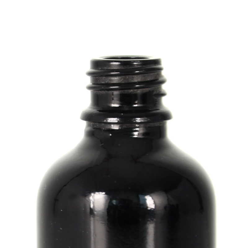5 ml 10 ml 15 ml 20 ml 30 ml 50 ml 60 ml 100 ml Verschiedene Volumina Schwarze Glasflasche mit ätherischen Ölen und goldener Aluminium-Tropfflasche für die Hautpflege